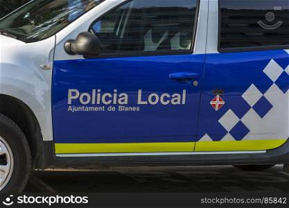 On the door of a police car, Policia Local (Blanes, Catalonia, Spain)
