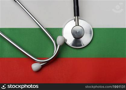 On the flag of Bulgaria is a stethoscope. The concept of medicine.. On the flag of Bulgaria is a stethoscope.