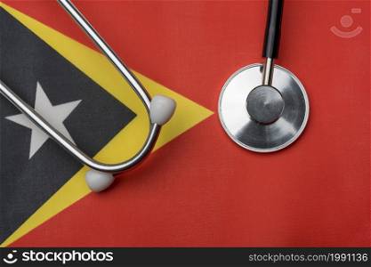 On the flag of East Timor is a stethoscope. The concept of medicine.. On the flag of East Timor is a stethoscope.