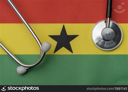 On the flag of Ghana is a stethoscope. The concept of medicine.. On the flag of Ghana is a stethoscope.