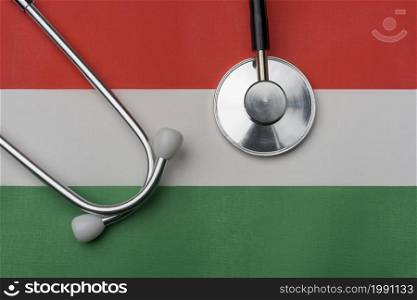 On the flag of Hungary is a stethoscope. The concept of medicine.. On the flag of Hungary is a stethoscope.