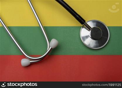 On the flag of Lithuania is a stethoscope. The concept of medicine.. On the flag of Lithuania is a stethoscope.