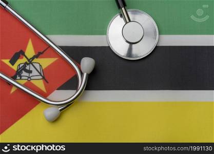 On the flag of Mozambique is a stethoscope. The concept of medicine.. On the flag of Mozambique is a stethoscope.