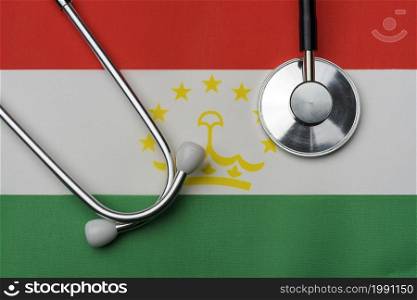On the flag of Tajikistan is a stethoscope. The concept of medicine.. On the flag of Tajikistan is a stethoscope.