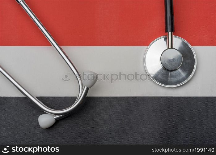 On the flag of Yemen is a stethoscope. The concept of medicine.. On the flag of Yemen is a stethoscope.