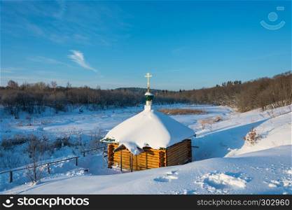 On the Holy Irinarkhovo spring in a sunny winter day near the village of Khaurovo, Borisoglebsky district, Yaroslavl region, Russia.