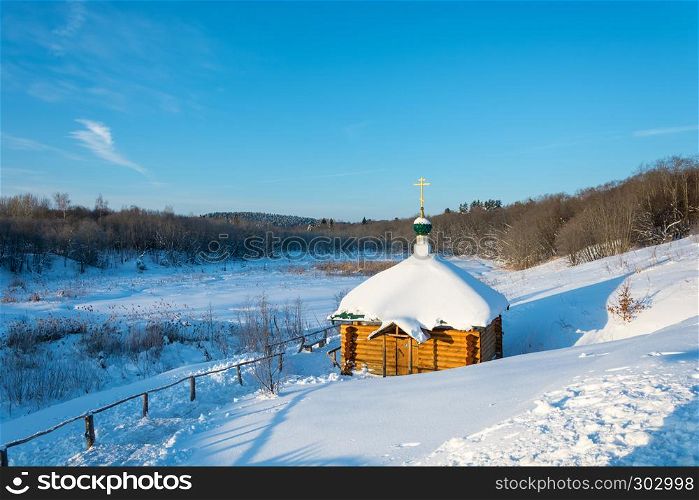 On the Holy Irinarkhovo spring in a sunny winter day near the village of Khaurovo, Borisoglebsky district, Yaroslavl region, Russia.