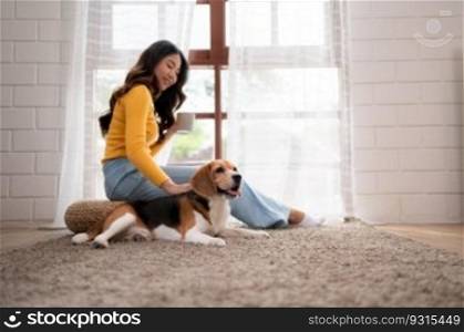 On weekends, a beagle and her owner sit in their living room, sipping coffee and gazing out the window.