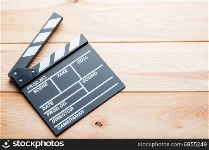 on wooden boards outdoor video clapper close-up