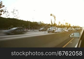 Oncoming traffic on american highway at sunset