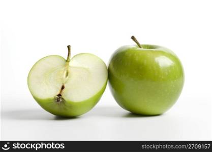 One and a half green Granny Smith apple