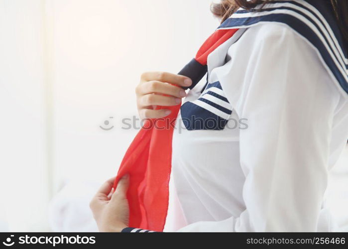 One asian school girl dressing up in white tone and flare