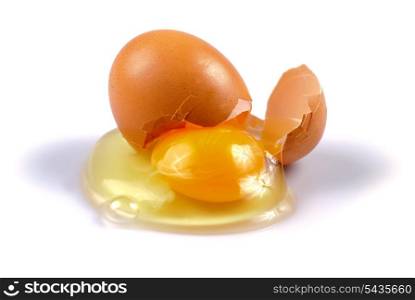 One beige cracked egg isolated on white