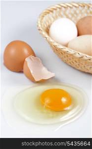 One beige cracked egg isolated on white