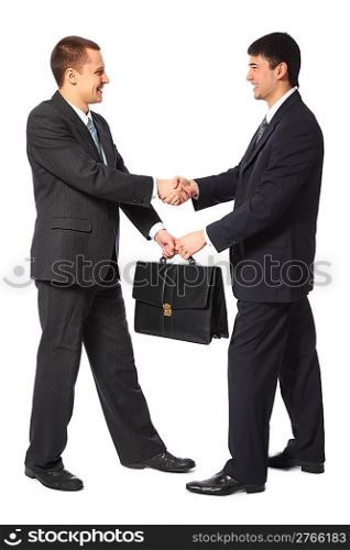 One businessman gives another briefcase full body