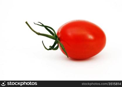one cherry tomato isolated on white