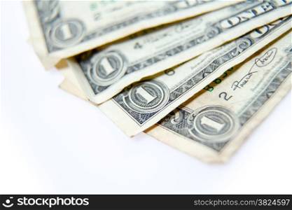 One dollar bills fanned with shallow depth of field