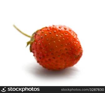 one fresh strawberry isolated on white (macro)