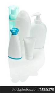 one green and three white care bottles