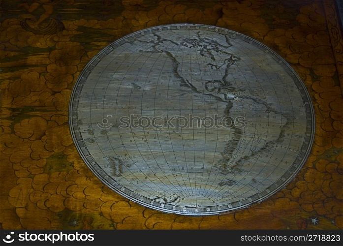 one halfth of an old globe showing North and South America