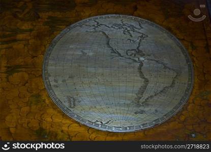 one halfth of an old globe showing North and South America