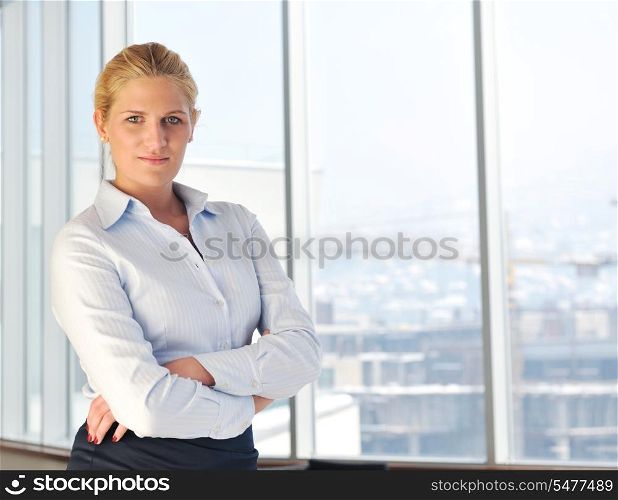 one happy young business woman working on laptop computer at group team meeting at modern office