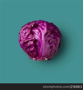 one head of raw red cabbage presented on a green background,vegetable. From color cabbage series. Red cabbage isolated on a green background