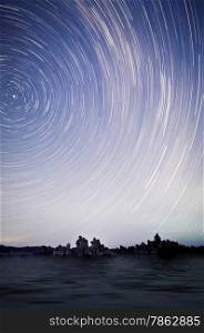 One hour sections of light and star trails over Mono Lake tufas.