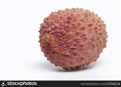 One lychee close up on white background