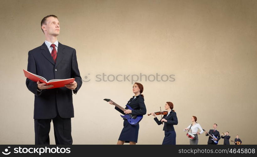 One man band. Young woman in suit playing different music instruments