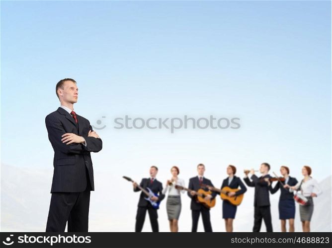 One man band. Young woman in suit playing different music instruments