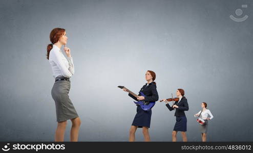 One man band. Young woman in suit playing different music instruments