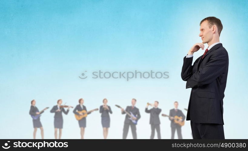 One man band. Young woman in suit playing different music instruments