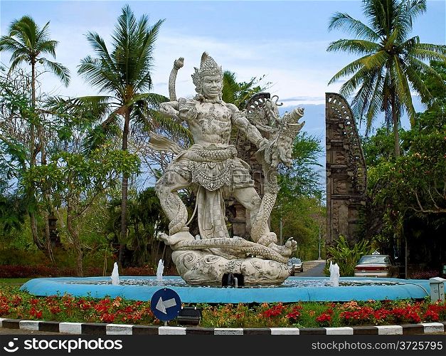 One of balinese modern concrete sculptures at square in Ungasan