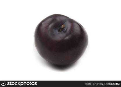 one organic and sweet plum isolated on white background