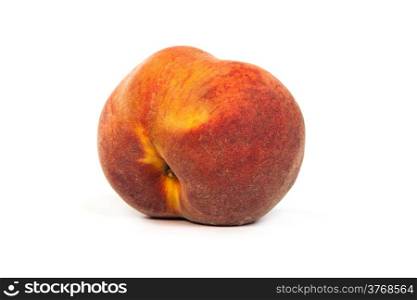 One perfect, ripe peache isolated on a white background.