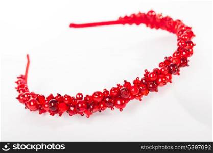 One red jewelry headbands for female hair. The jewelry headbands