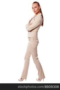 One Standing business woman wearing beige suit isolated on white. Standing serious businesswoman