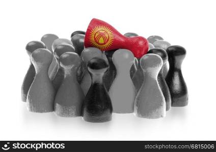 One unique pawn on top of common pawns, flag of Kyrgyzstan