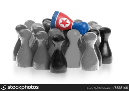 One unique pawn on top of common pawns, flag of North Korea