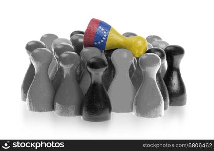 One unique pawn on top of common pawns, flag of Venezuela