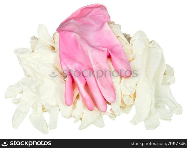 one used pink protective glove on pile of new medical gloves isolated on white background