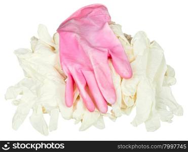 one used pink protective glove on pile of new medical gloves isolated on white background