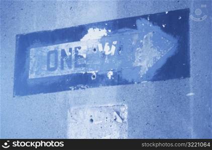 One Way Sign Painted on Wall