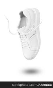 One White sneaker and floating rope. Isolated on white background with clipping path