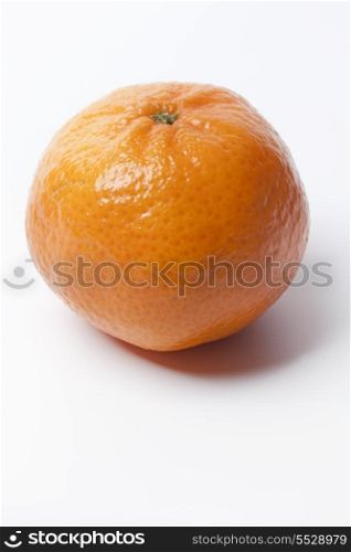 One whole single tangerine