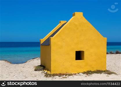 One yellow slave house at the beach of Bonaire