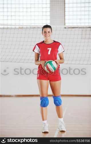 one young girl playing volleyball game sport indoor
