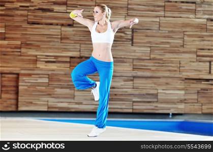 one young healthy woman exercice fitness recreation and yoga indoor