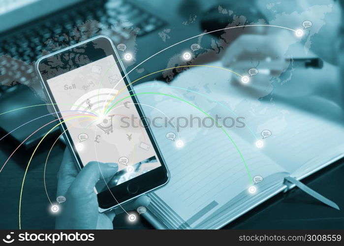 Online business concept, buying, selling, shopping. The businessman clicks on mobile touch screen. Elements of this image furnished by NASA.